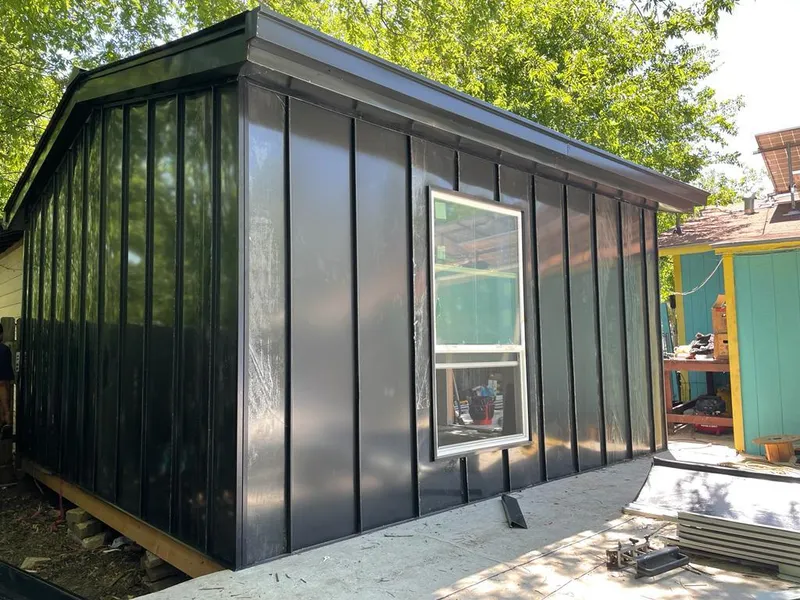 Black standing seam metal wall panels for Metal Roof Installation in Rushville