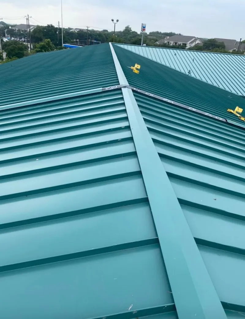 Green commercial metal roof ridge and valley for Metal Roof Repair in Rushville